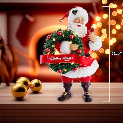 Kurt Adler 10.5-Inch Fabriché™ Coca-Cola® Battery Operated Santa with Lighted Wreath