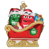 Old World Christmas M&M'S in Sleigh Glass Blown Ornament for Christmas Tree, Handcrafted Holiday Decoration, M&Ms Collection